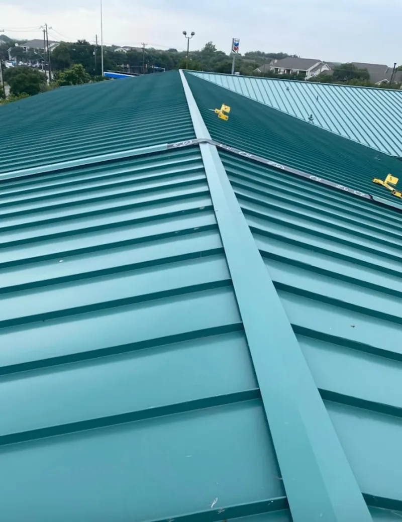 Green commercial metal roof ridge and valley for Metal Roof Repair in Grosse Ile