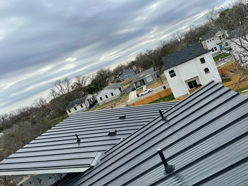 Standing seam metal roof panels with vents for Skylight Repair in Grosse Ile